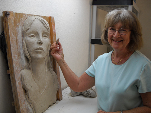 Artist Jean Preston putting final touches on Sacagawea sculpture